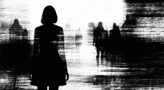 Abstract monochrome image of a pensive female figure with some unknown figures in the distance.